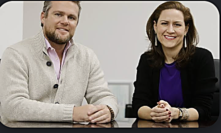 William Skelley with a colleague at a business meeting